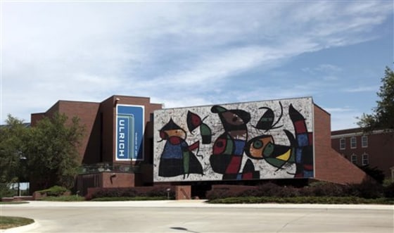 This photo provided by the Ulrich Museum of Art at Wichita State University shows a mural installed on the museum by Joan Miro in Wichita, Kan. Conservation crews will begin removing modern master Joan Miro’s massive 26-by-52 foot mosaic from an art museum at Wichita State University next week as a five-year, $3 million restoration effort begins to stop the work from raining down pieces of Venetian glass and marble. Miro was one of the leading artists in the School of Paris along with Pablo Picasso and Marc Chagall.
